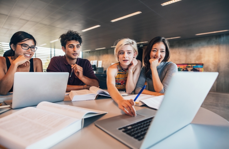 students sitting around a table